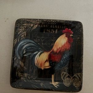 Set of 4 salad plates.Designed by Susan Winget. Ceramic microwave safe